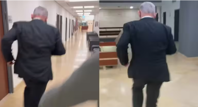 Benjamin Netanyahu walking through the corridors of the Knesset, Israel's parliament