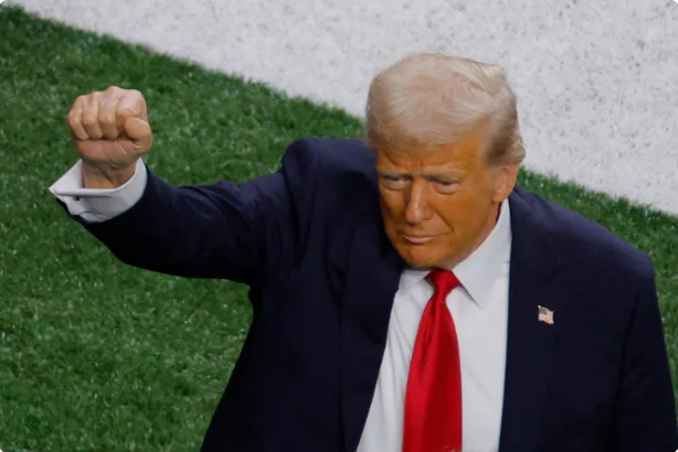 US President Donald Trump gestures inside the stadium before the Super Bowl LIX game between the Eagles and Chiefs in New Orleans on February 9, 2025.